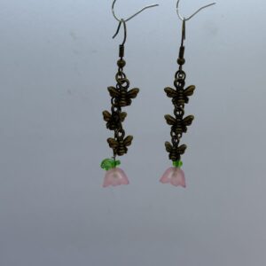 Oorbellen 3 vlinders brons bloemetje roze