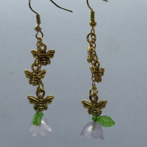 Oorbellen 3 vlinders goud bloemetje paars