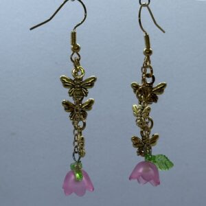 Oorbellen 3 vlinders goud bloemetje roze