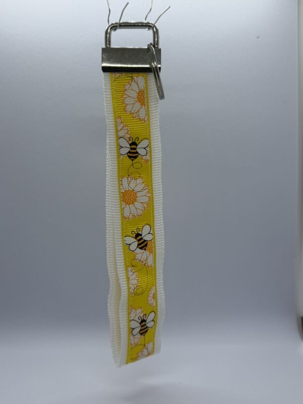 sleutelhanger handvat wit geel